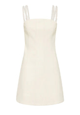 An ivory vegan leather mini dress with a square neckline, braided straps, and a fit-and-flare silhouette.